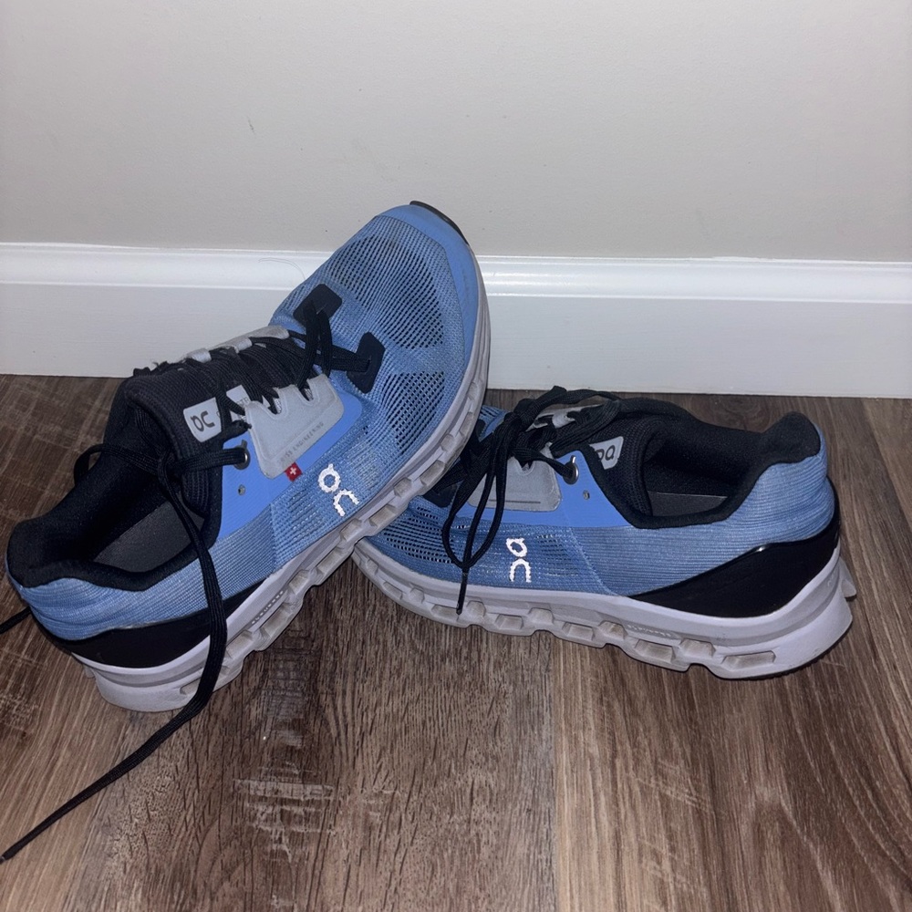 On Running Light Blue and Black Athletic Shoes